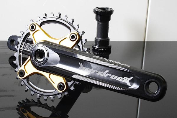 Kit pédalier 1 x groupe 12 vitesses - cassette, levier de vitesses, dérailleur arrière, chaîne dorée.