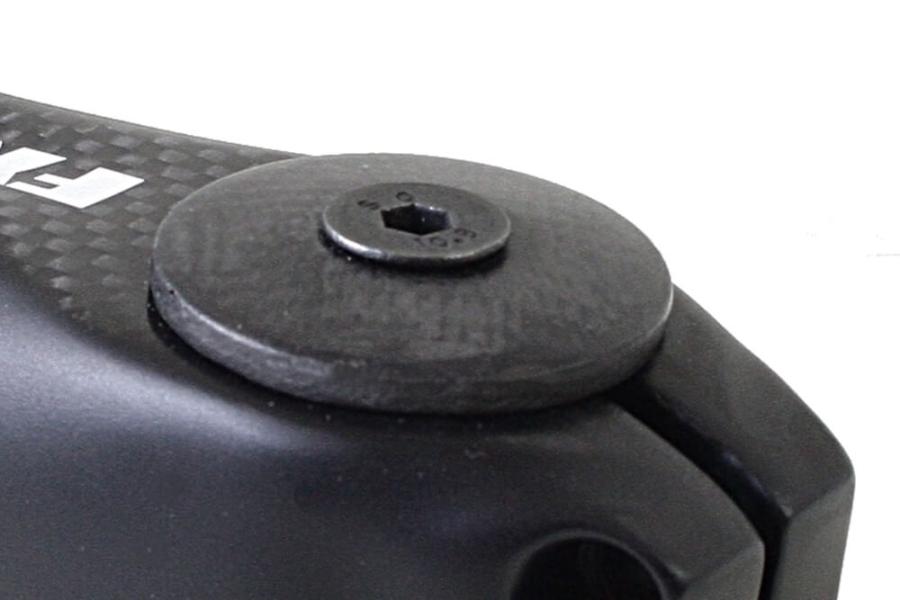 Carbon a-head stem cap with alu claw for 1 1/8 inch headset.