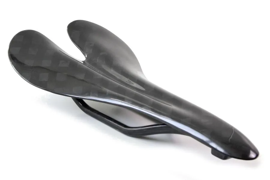 Feathery Carbon Saddle GTX - 12K Design. Feathery Carbon Saddle GTX - 12K Design.